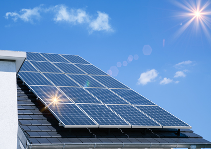 Roof of house with solar panels